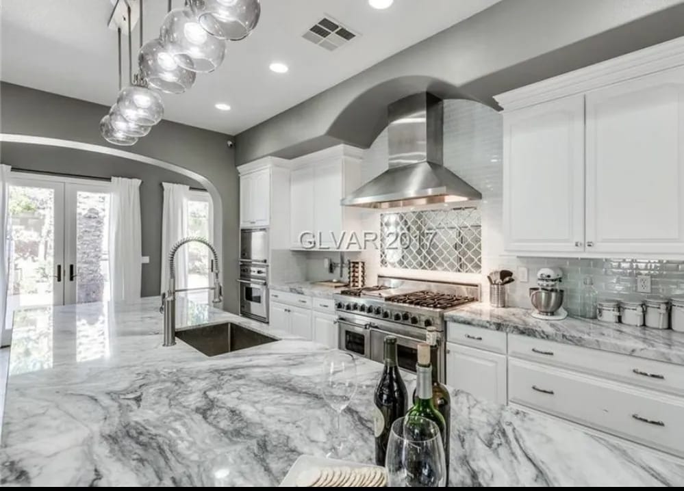Freshly painted white kitchen cabinets in a modern Las Vegas home