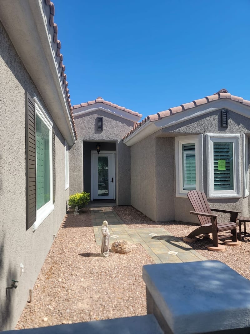 Single-family home exterior with stucco paint finish